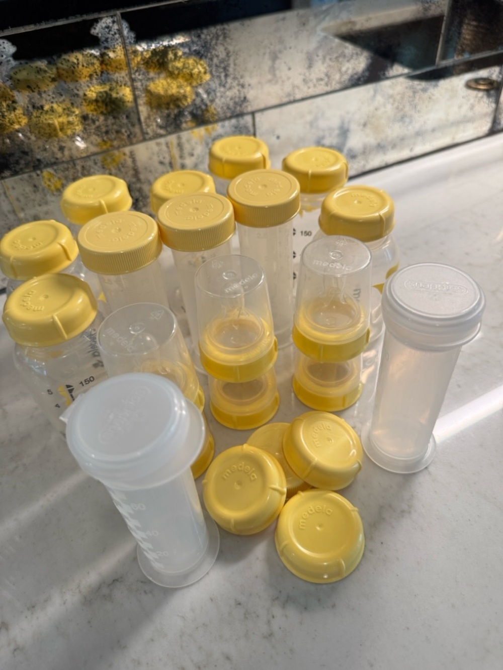 Medela and Snappies Milk Storage Bottles, Nipples & Lids, Extra Lids